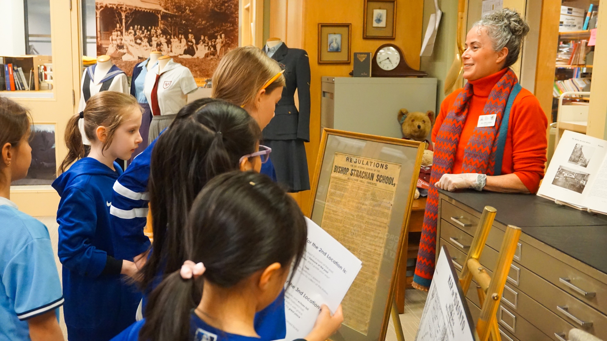 Students learning about an archival document