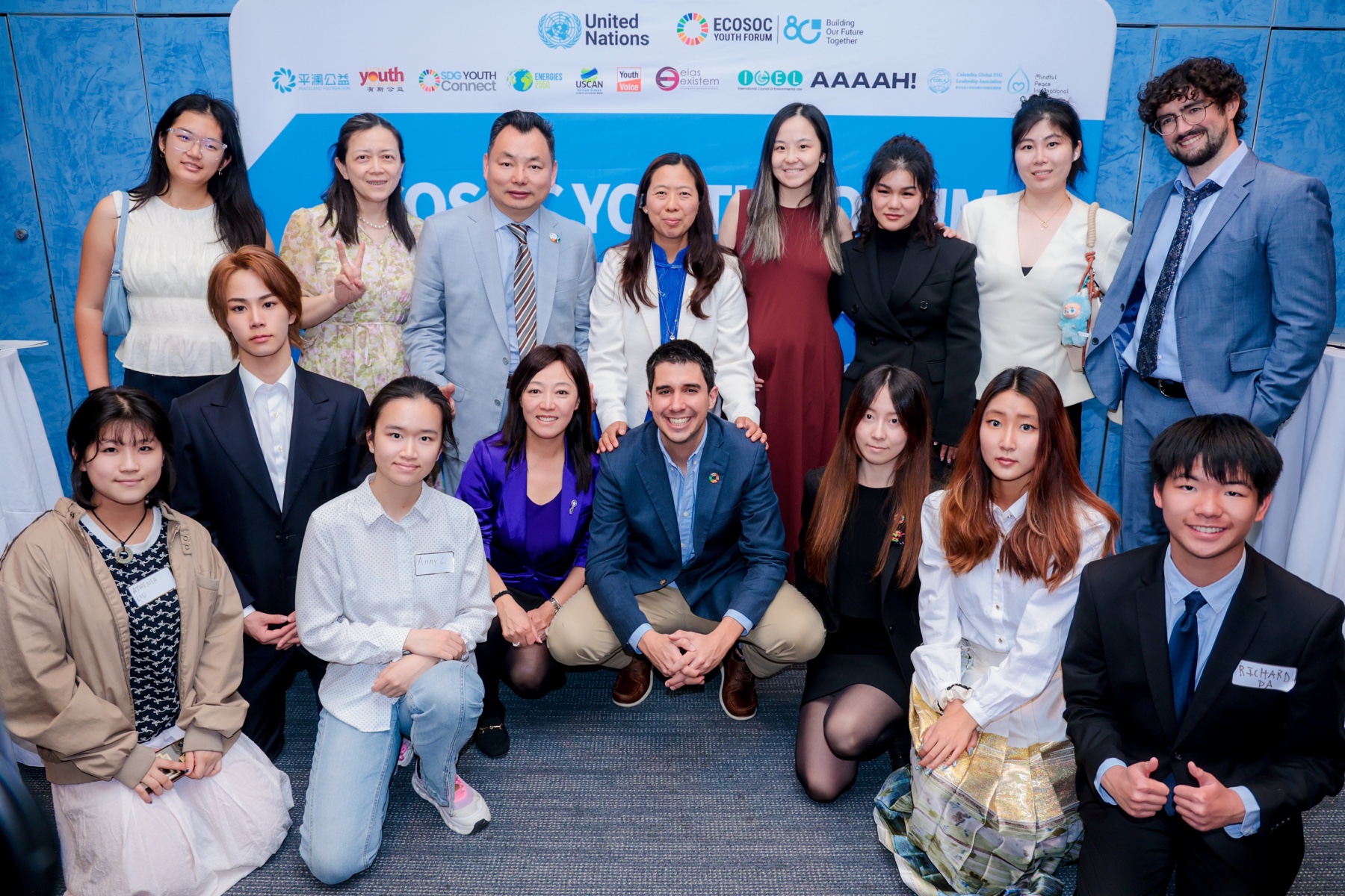 Youth speakers, organizers, and participants at the event